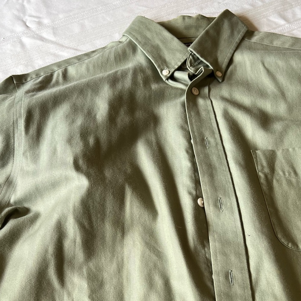 Gently used means button down short sleeve shirt.